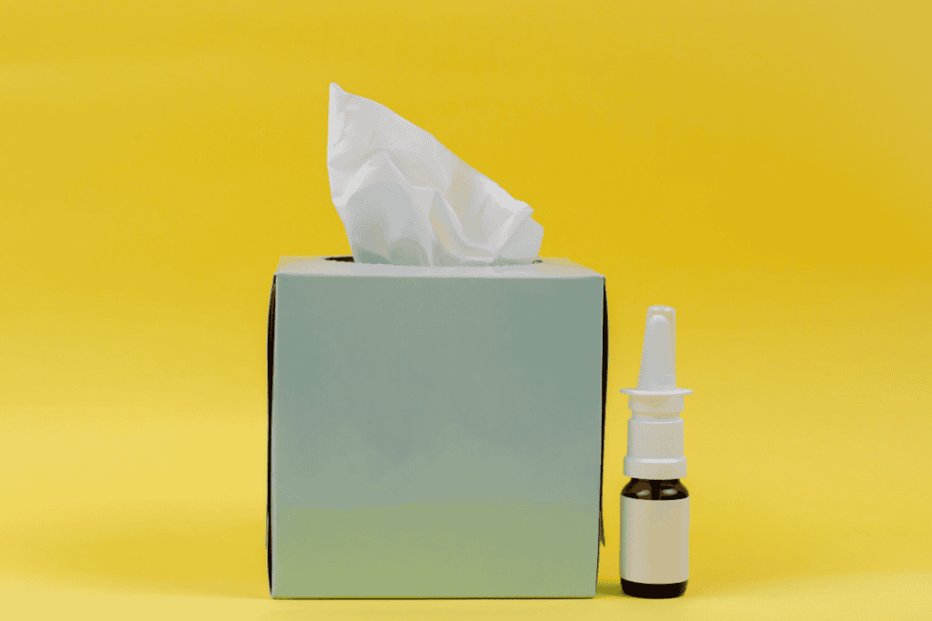 tissue box and nasal spray signify allergies and depression
