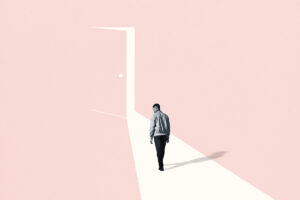 man walking towards door in black and white