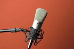 radio microphone in front of auburn background