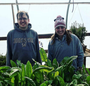 woman and man smiling in garden