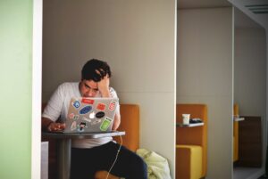 man working on laptop