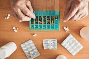 pill packs and pill box being filled