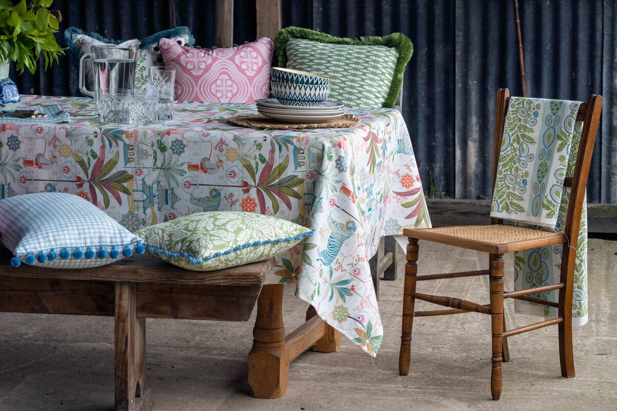 mock-up scene of a table setting showcasing the fabric designed by charlotte gaisford designer