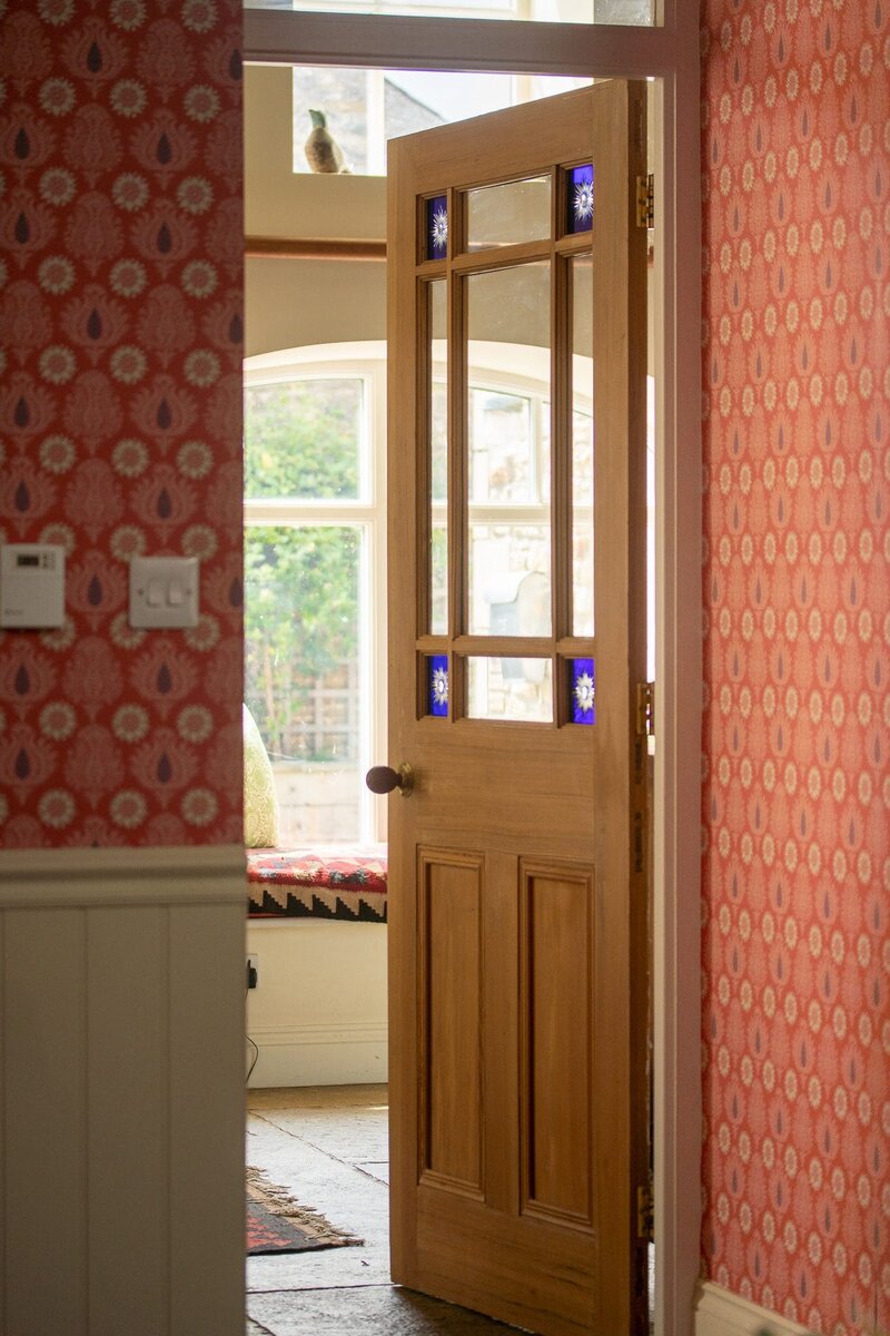 Open doorway at Charlotte Gaisford's home taken by Georgie Greene Photography for her personal branding shoot
