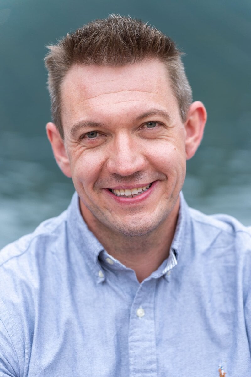 Ext: Young man wearing blue having an authentic dating photo by online dating photographer Georgie Greene in Sydney NSW