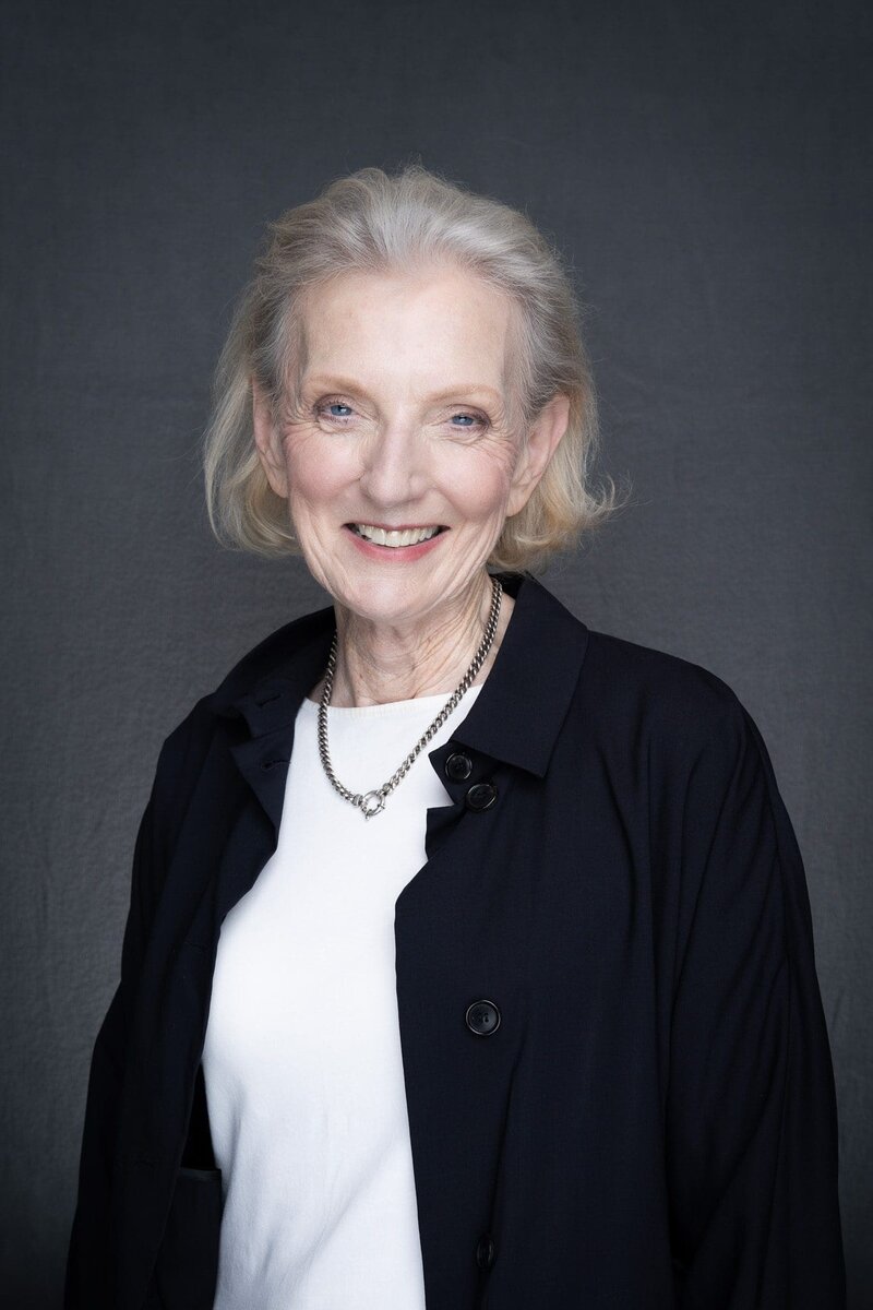 Journalist Helen Trinca wearing a navy coat having her headshot taken by corporate photographer Georgie Greene in Sydney NSW
