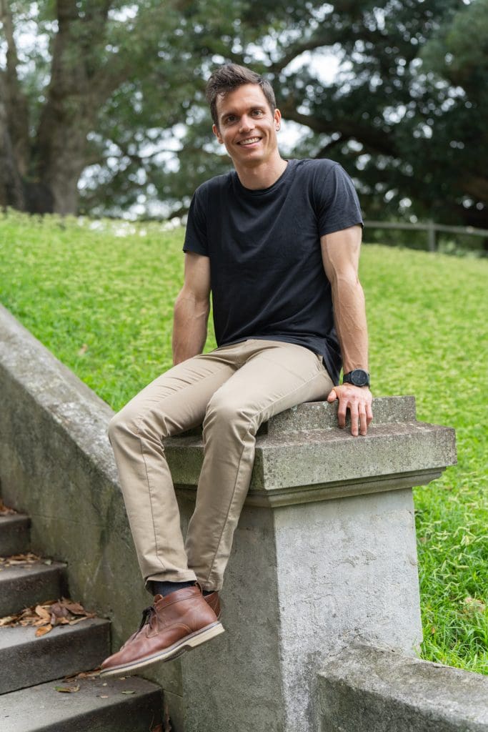 Dating-App-Photography-Sydney – Professional Photographer Sydney Ext: Young man sitting on a stone post having dating app photography taken by dating photographer Georgie Greene in Sydney NSW