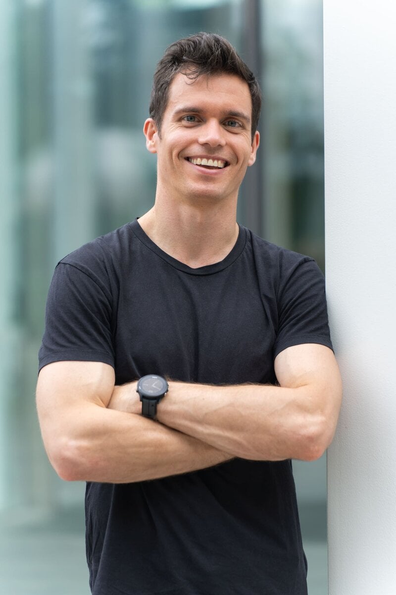 Ext: Young man wearing a black top having a dating profile photoshoot with professional photographer Georgie Greene in Sydney NSW