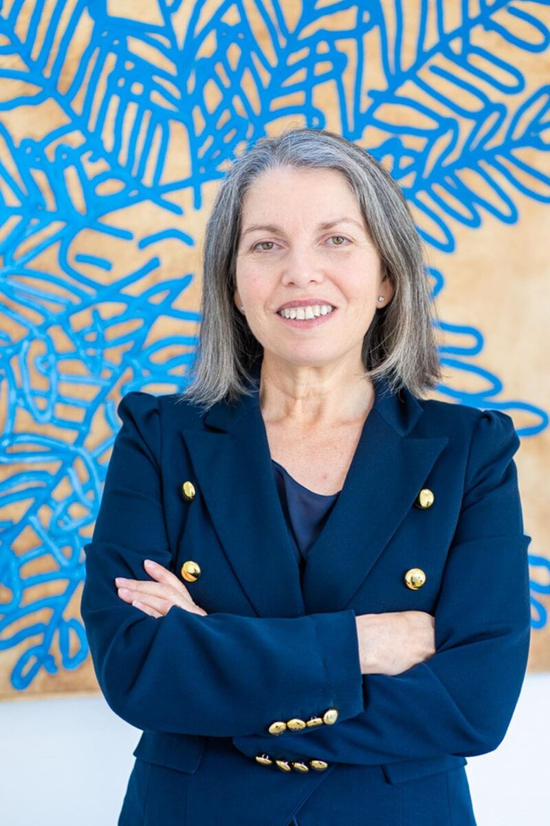 Int: Leadership coach/author wearing a blue suite having her personal photoshoot with Branding photographer Georgie Greene in Sydney NSW