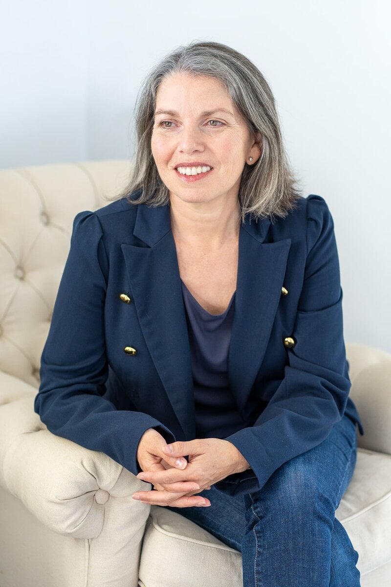 Int: Leadership coach/author wearing a blue suite having personal branding photos taken by photographer Georgie Greene in Sydney NSW