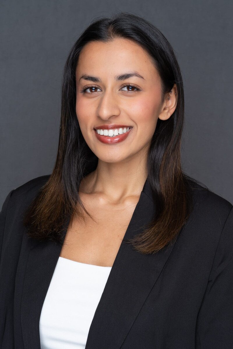 Int: Young Indian woman wearing black having professional headshots taken by Sydney Headshots Photographer Georgie Greene in Sydney NSW