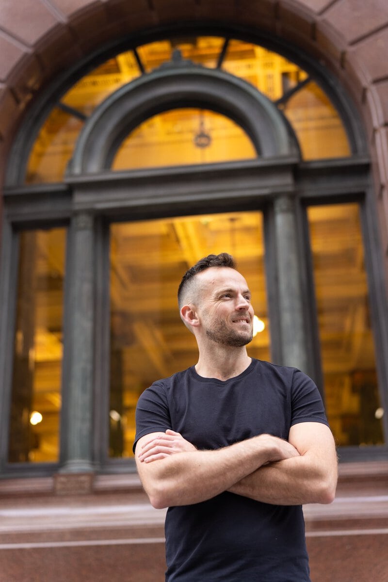 Ext: Young man wearing black having photography for dating taken by professional photographer Georgie Greene in Sydney NSW
