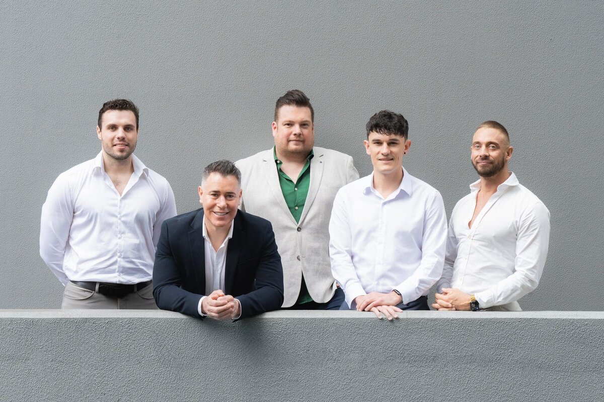 Group of five property managers having a company group shot taken by professional photographer Georgie Greene in Sydney NSW