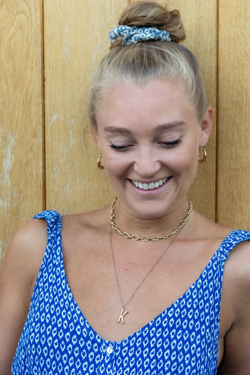 Ext: Young blonde woman in blue having a relaxed dating photo taken by dating photographer Georgie Greene in Sydney NSW
