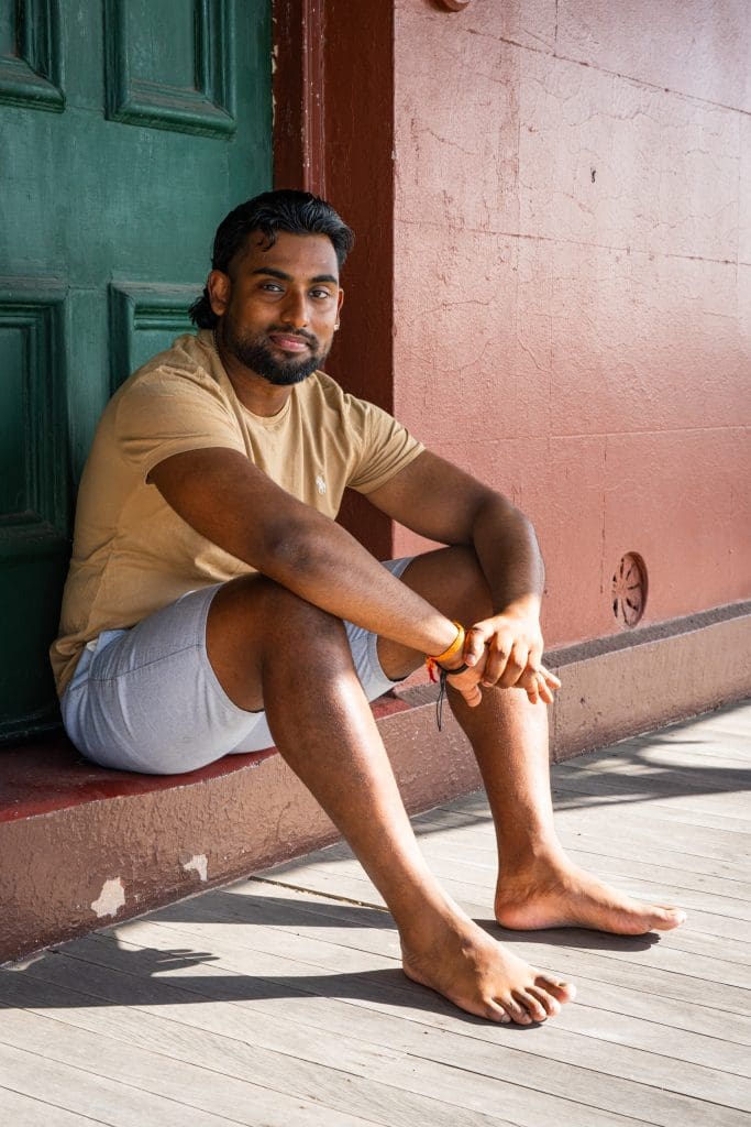 Relaxed-Portrait-For-Dating-Profile-Sydney-NSW – Professional Photographer Sydney Ext: Young Indian man in bare feet having a relaxed portrait taken by dating photographer Georgie Greene in Sydney NSW