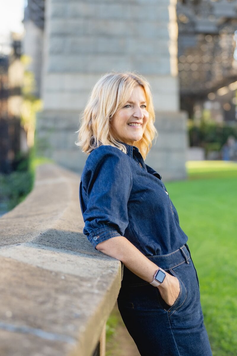 Ext: Executive Coach wearing a blue outfit having portrait shots taken by personal branding photographer Georgie Greene in Sydney NSW