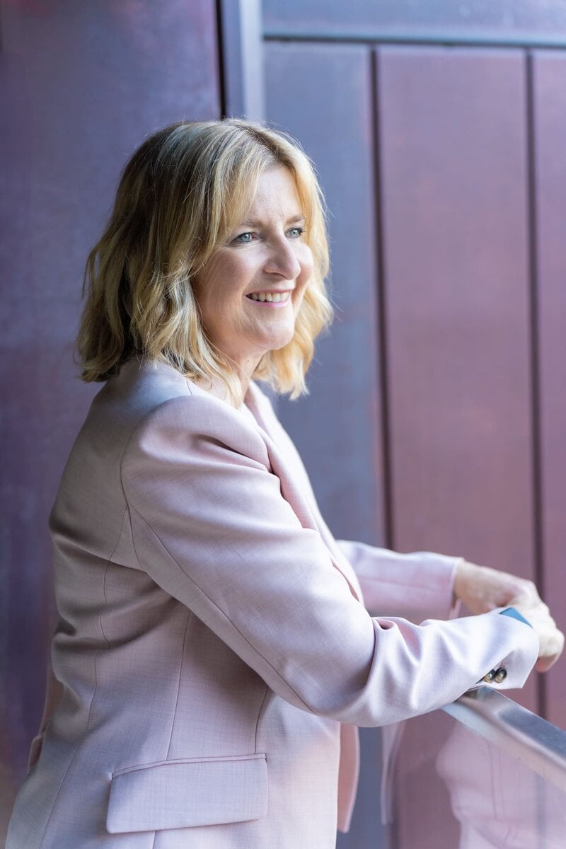 Ext: Executive Coach wearing a pink suit having her personal photoshoot with Branding photographer Georgie Greene in Sydney NSW