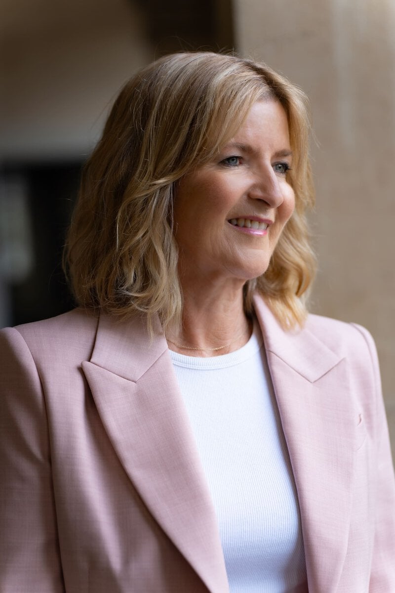Ext: Executive Coach wearing pink having her branding photos taken by portrait photographer Georgie Greene in Sydney NSW