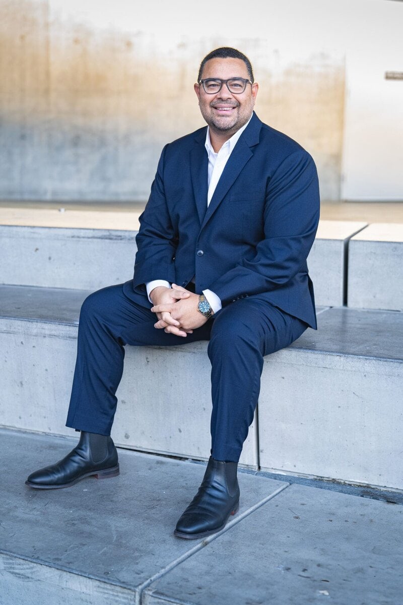 Male Finance manager wearing a blue suite and having his business headshot taken by Sydney corporate photographer Georgie Greene