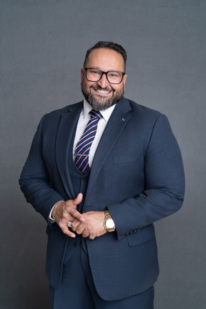 Smart-Sydney-Headshot-NSW – Professional Photographer Sydney Man with a beard and glasses wearing a three piece suite having his corporate headshot taken by professional photographer Georgie Greene