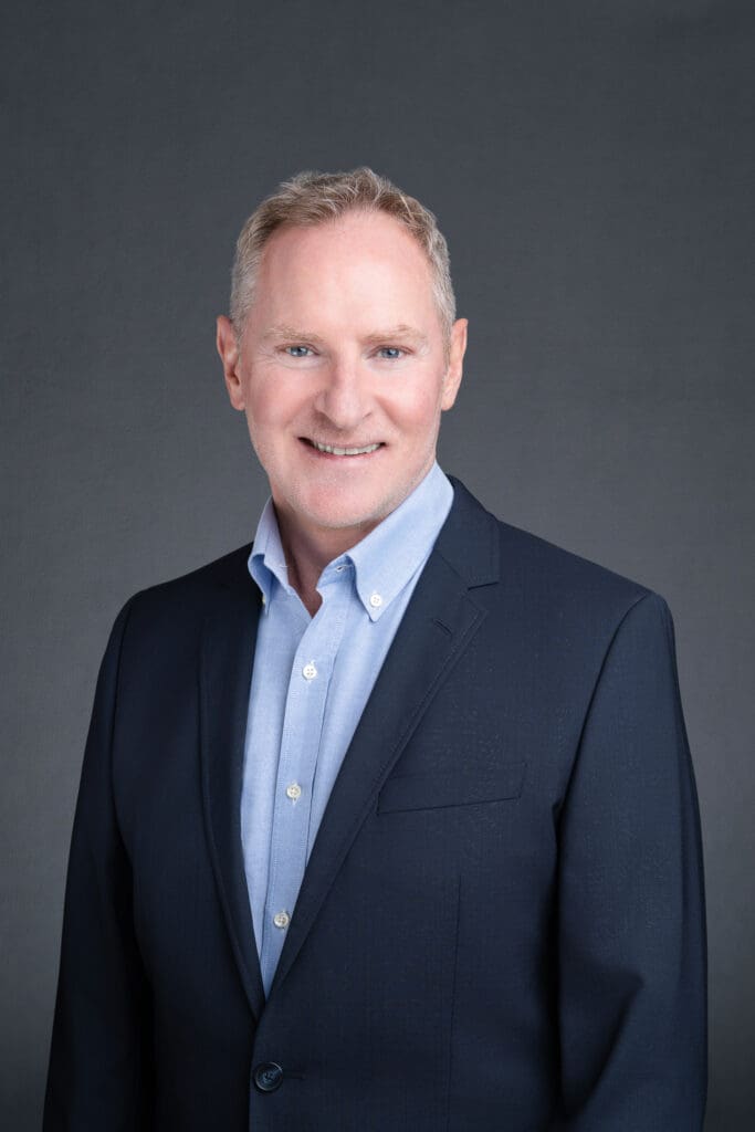 Blonde Man with a blue suite having his formal business headshot taken by Sydney headshot photographer Georgie Greene