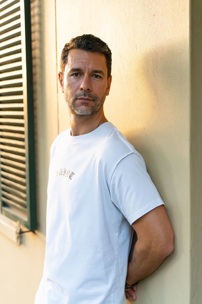 Dark hair man with beard wearing a white shirt having his dating photo taken by top Sydney dating photographer Georgie