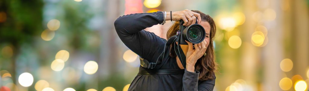 Georgie Greene Sydney headshots and personal branding Sydney photographer taking a photograph in the street
