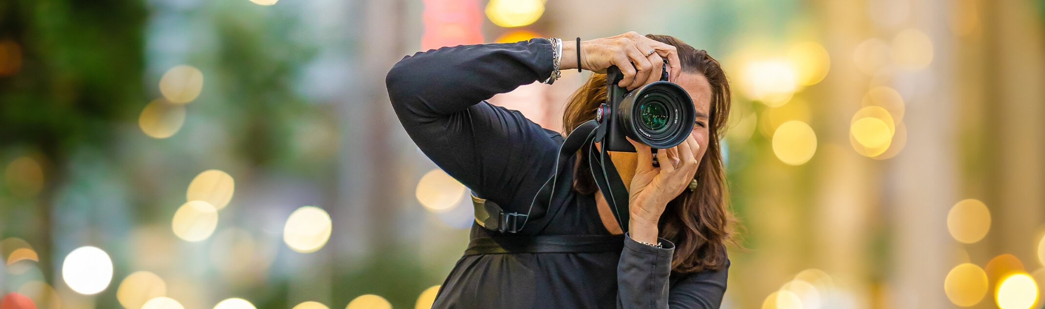 Georgie Greene Sydney headshots and personal branding Sydney photographer taking a photograph in the street