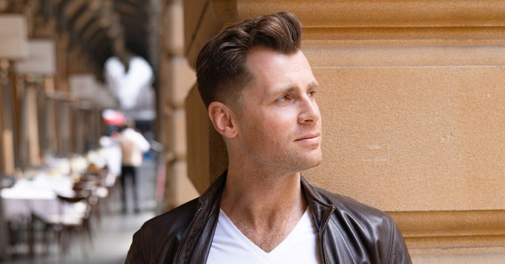 Dating-Photography-Sydney-NSW – Professional Photographer Sydney young man in a leather jacket having his dating photo taken by Sydney dating photographer Georgie Greene