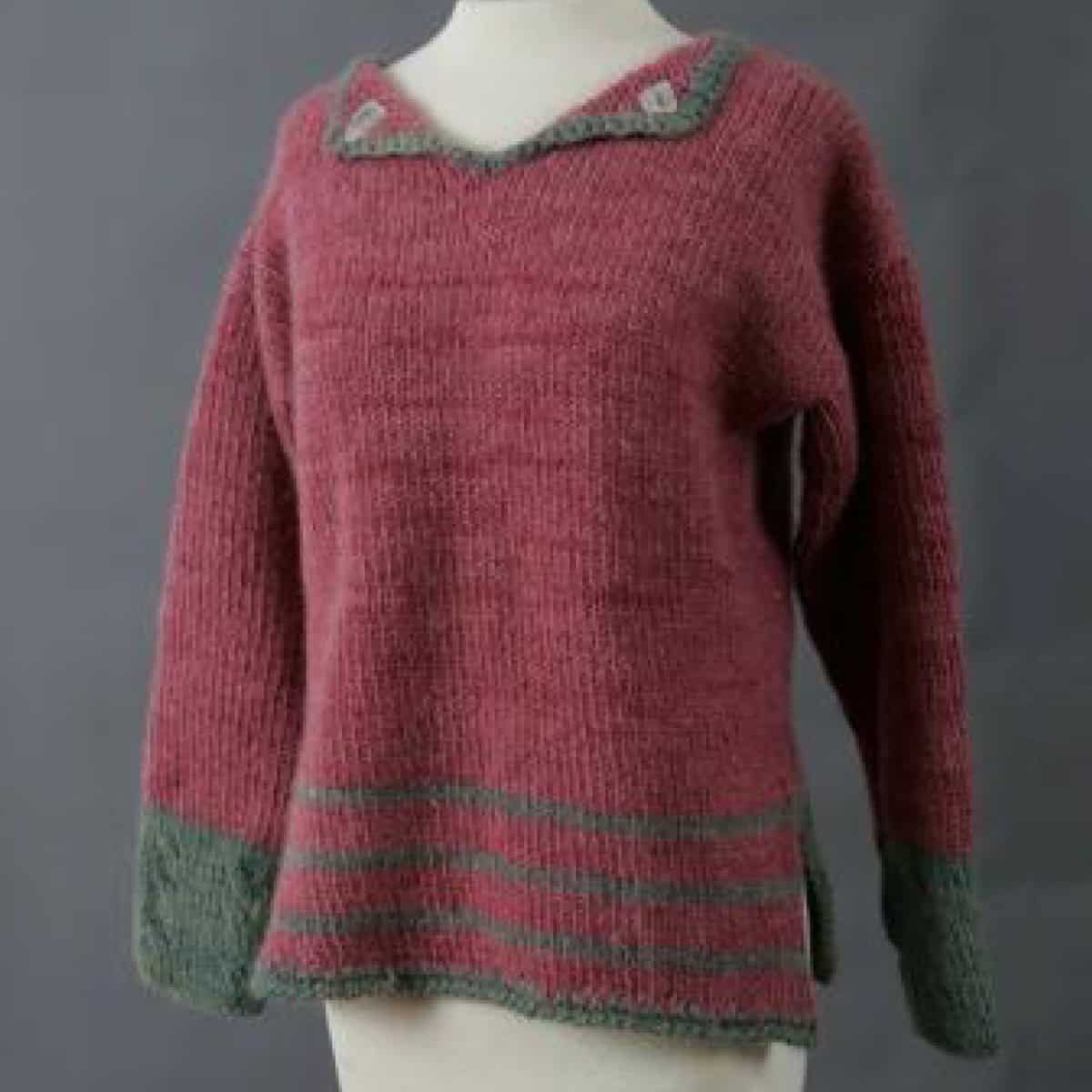 Soft hand-knit wool sweater featuring colorful, textured Seacolors Yarnery yarns for cozy, stylish winter wear, showcasing vibrant color blends and premium quality wool.