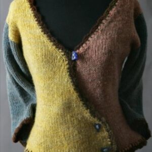 Soft handcrafted wool sweater featuring color-block design with yellow, brown, and black hues, perfect for cozy fall or winter wear.
