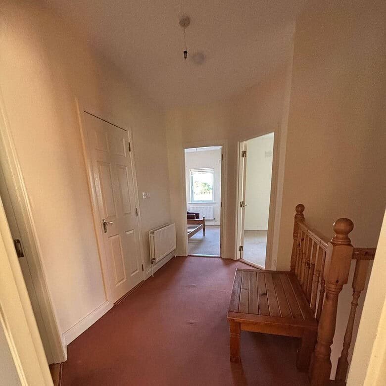 Hallway with a wooden bench in this bright 3 bed Mullingar property. – Ghar.ie property listing