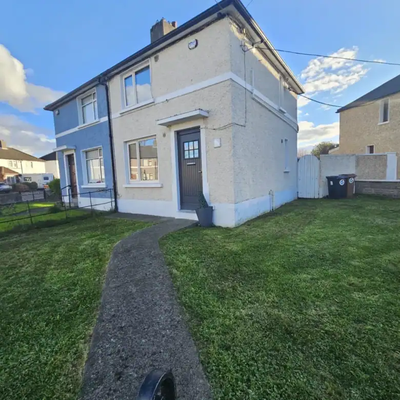 Exterior view of the Drimnagh 2-bedroom apartment for rent, showcasing the front garden and entrance. – Ghar.ie property listing
