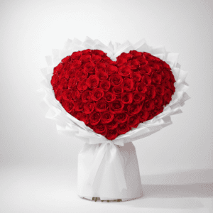Heart-shaped bouquet of red roses for romantic occasions.
