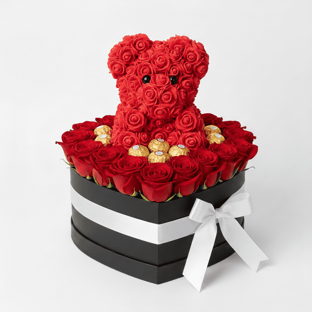 Shaped gift box filled with red roses, a teddy bear, and Ferrero chocolates for special occasions.
