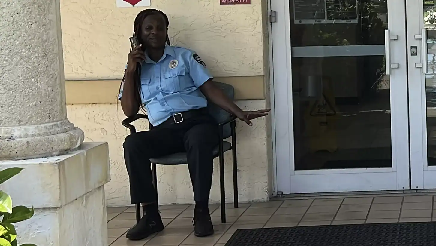 Allied Universal security guard Tennile Coleman at the Palm Beach County Community Services Department GCNN Good Citizen News Network goodcitizennewsnetwork.com News That's Not Fake
