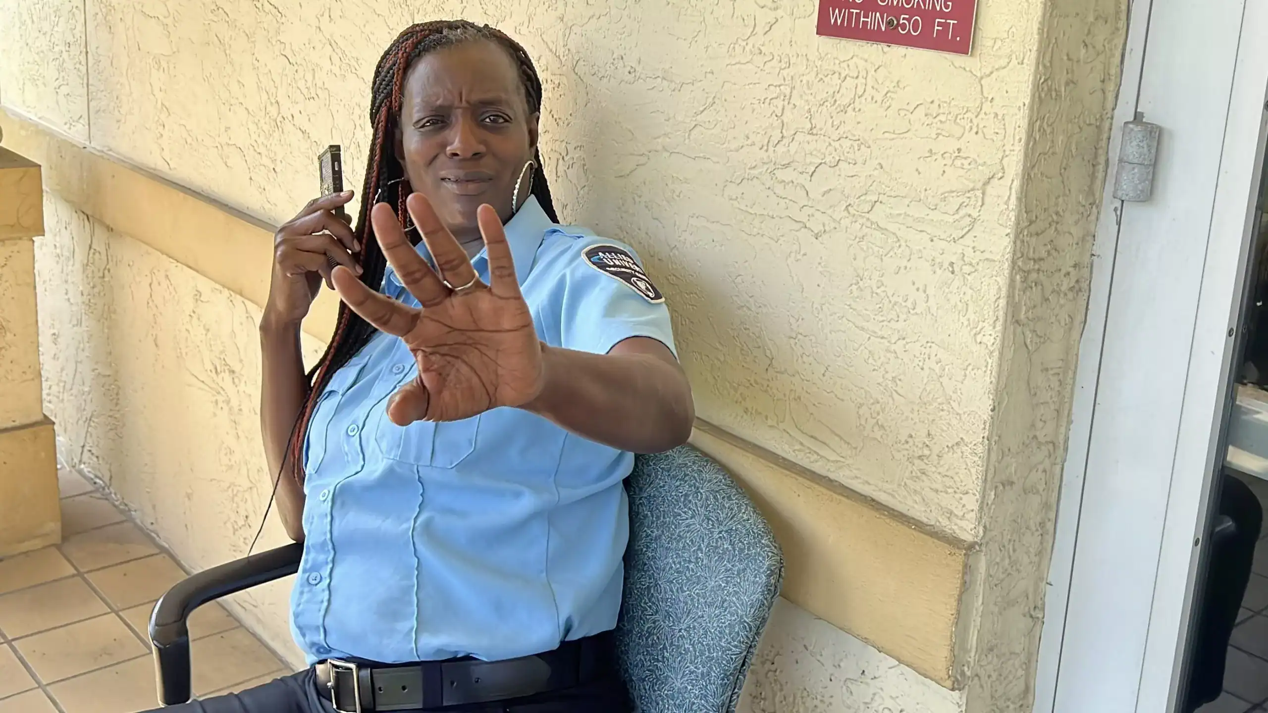 Allied Universal security guard Tennile Coleman at the Palm Beach County Community Services Department GCNN Good Citizen News Network goodcitizennewsnetwork.com News That's Not Fake