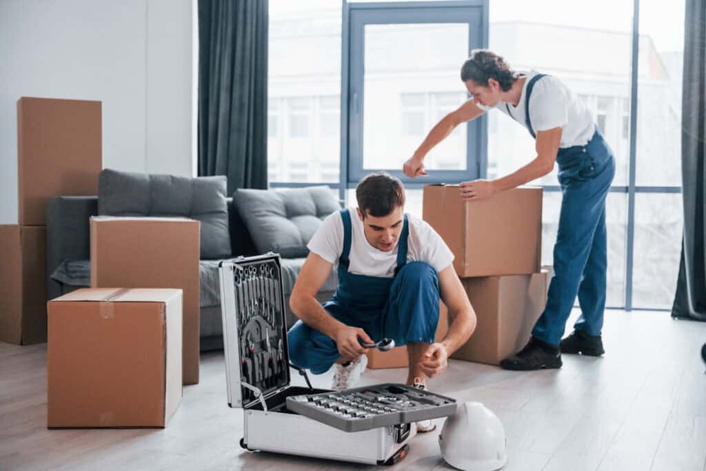 Movers in Alameda packing boxes and preparing for a move.