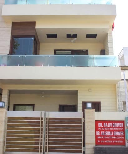 Modern building of Grover Gastro and Fertility Centre with signage.