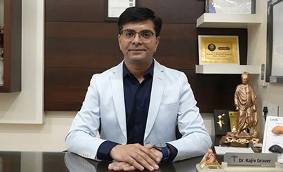 Doctor in white coat at Grover Gastro and Fertility Centre.