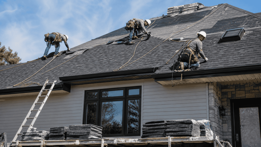 Licensed and insured roofing crew installing a roof replacement in Avon Lake, OH Licensed and insured roofing crew installing a roof replacement in Avon Lake, OH