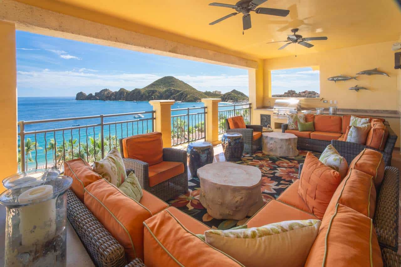 Luxurious Ocean View Terrace At Hacienda With Comfortable Seating And Stunning Coastal Scenery.