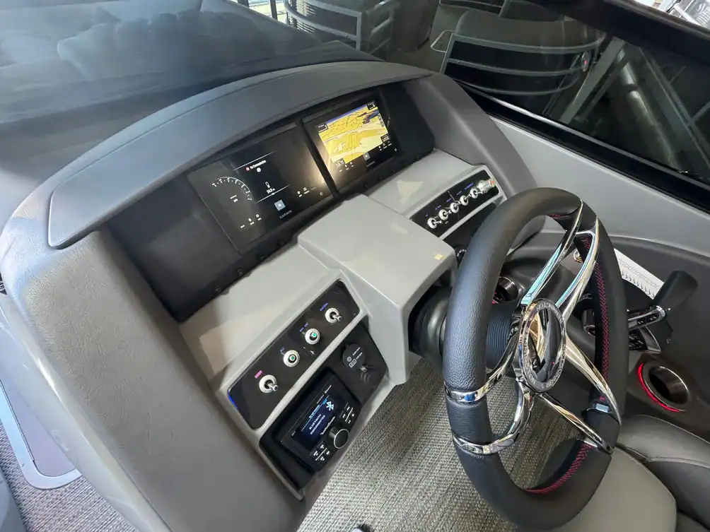 High-quality RV interior featuring digital dashboard, GPS, and steering wheel controls for optimal driving experience.
