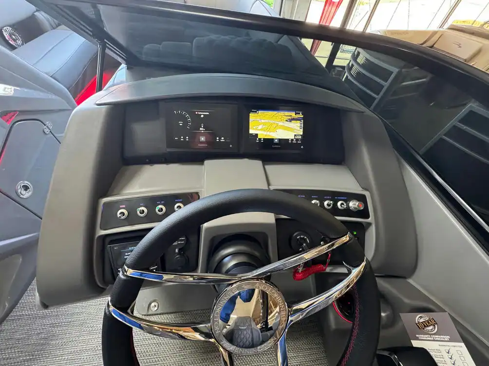 Modern bus dashboard with digital display and GPS navigation system.