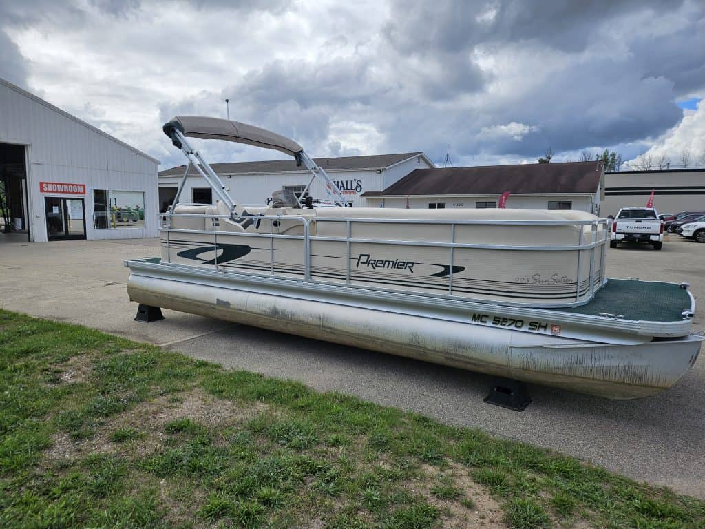 Pontoon boat for sale at Hall's Sport Center, ideal for family outings and water adventures.