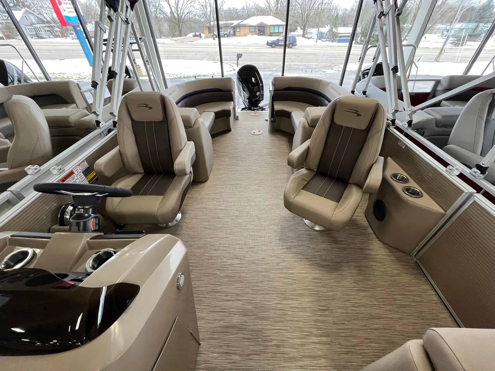 Pontoon boat seats with comfortable plush cushions and modern design. Perfect for relaxing on the water.