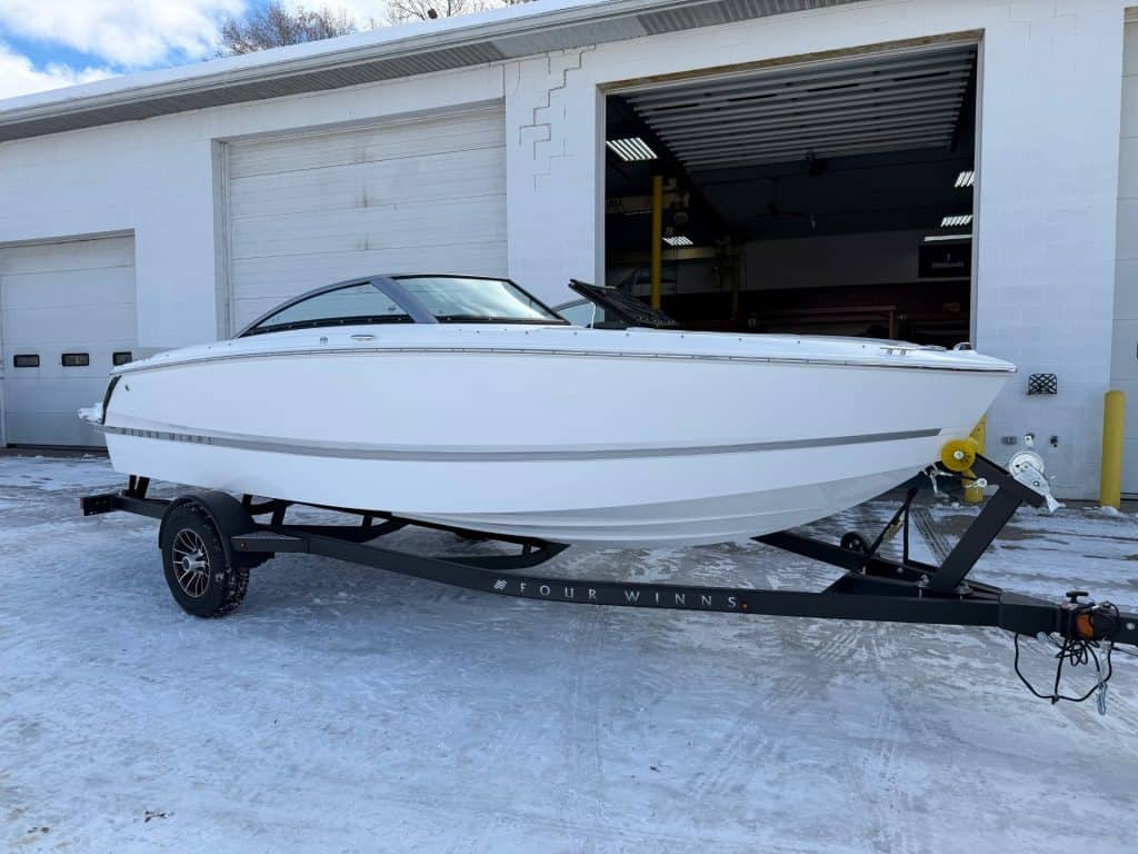 Modern Four Winns H1 Freedom boat at Hall's Sport Center dealership.