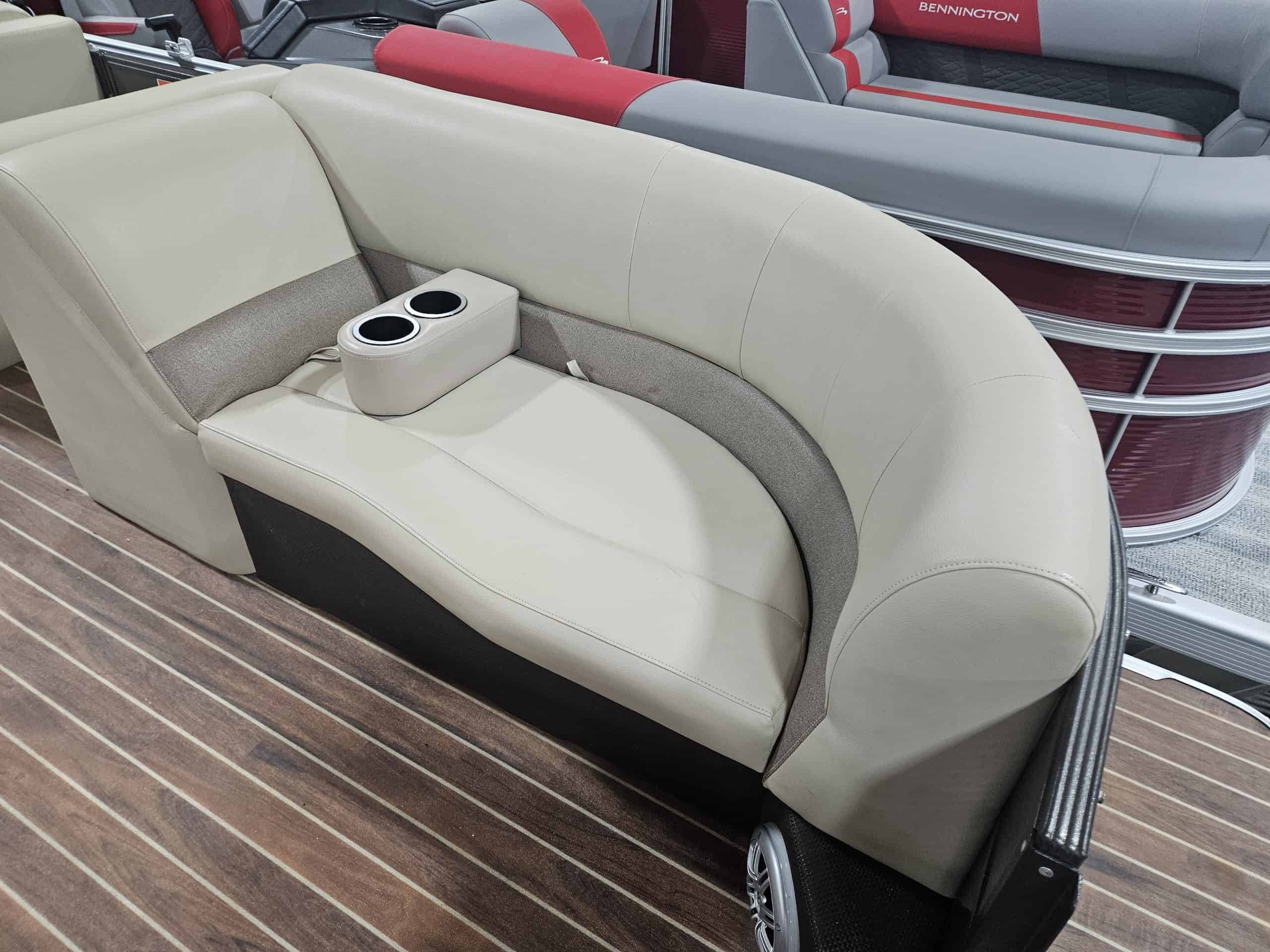 Comfortable Crest 220 CPT boat seating with built-in cup holders.