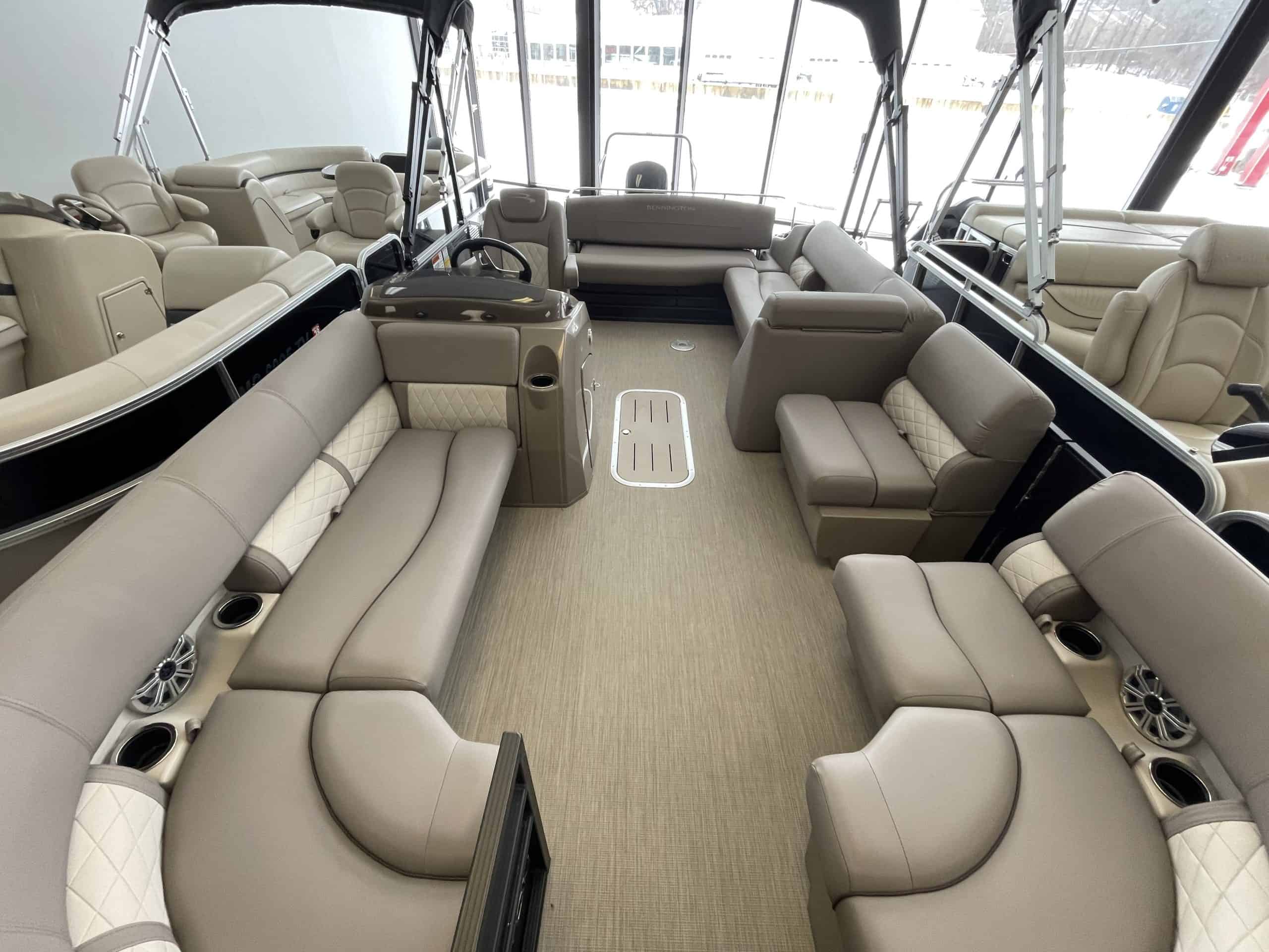 Spacious interior of the 2017 Bennington 22 SXPSB pontoon boat at Hall's Sport Center.