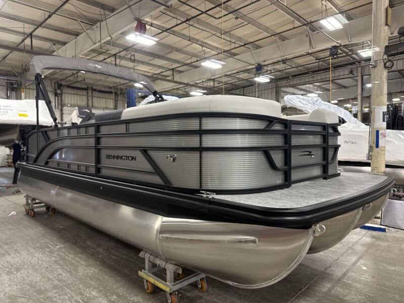 Pontoon boat by Bennington at Hall's Sport Center.
